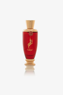 Red and gold Arabian oud perfume bottle labeled Taraf on white background