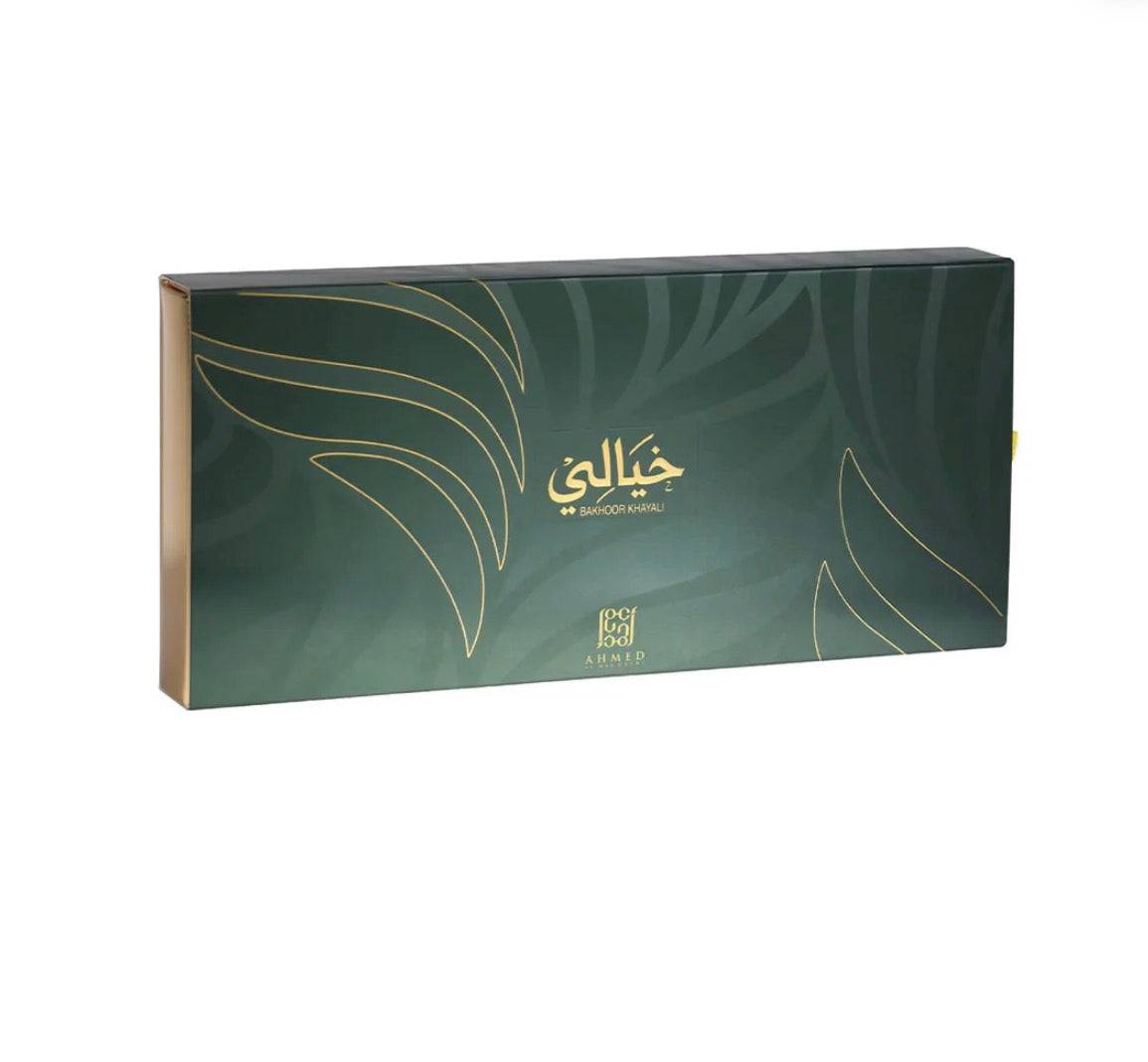 Green box with gold leaf design and text on a white background