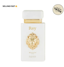 Maison Asrar Rey white perfume bottle with gold lion head, luxury fragrance, viral on TikTok