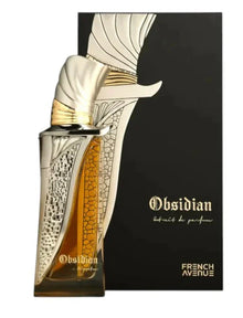 Obsidian extrait de parfum in a decorative gold bottle with matching luxury presentation box.