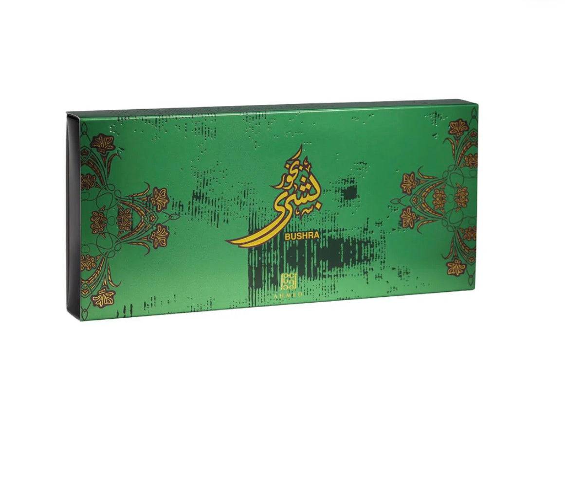 Green packaging box with decorative elements and 'Bushra' branding on a white background