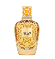 Gold Arabian perfume bottle with honeycomb pattern and NECTARE extradose label