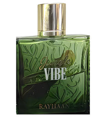 Green glass Jungle Vibe Rayhaan perfume bottle with gold cap and leaf pattern design