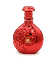Red ornate Arabian oud perfume bottle labeled NYLA, elegant and reflective design