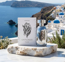Mykonos Untamed Extrait de Parfum 100ml bottle highlighting notes of crisp linen, blackcurrant, coconut soap, praline, and black amber