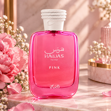 Rasasi Hawas Pink Eau de Parfum 100ml bottle featuring python cap highlighting notes of neroli, marshmallow, and cotton candy
