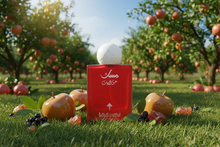 Red perfume bottle in orchard with apples, pomegranates, blackcurrants, and amber stones