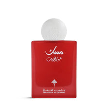 Red Ibraheem Al Qurashi perfume bottle with Arabic text and white decorative cap