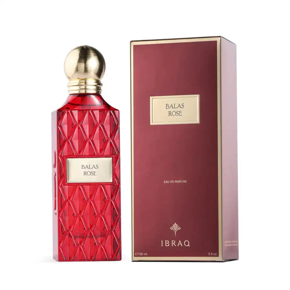 Balas Rose perfume in a decorative red glass bottle with matching box, luxury Arabian fragrance.