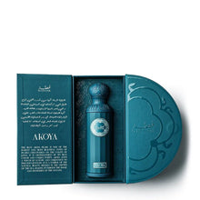 Elegant blue Arabian oud perfume bottle labeled Akoya in a decorative gift box with Arabic text.