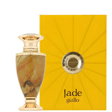 Luxurious marble-patterned perfume bottle with gold accents beside a yellow Jade Giallo box.