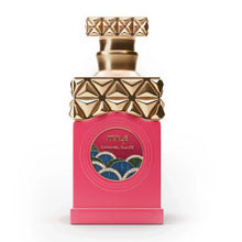 Pink luxury perfume bottle with gold cap, labeled minya Caramel Dulce, elegant design.