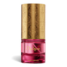 Pink and gold Dulzura Paris Corner perfume bottle with ornate cap, luxury fragrance
