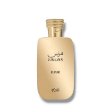 Gold bottle of Hawas Elixir Arabian oud perfume with Arabic script on white background