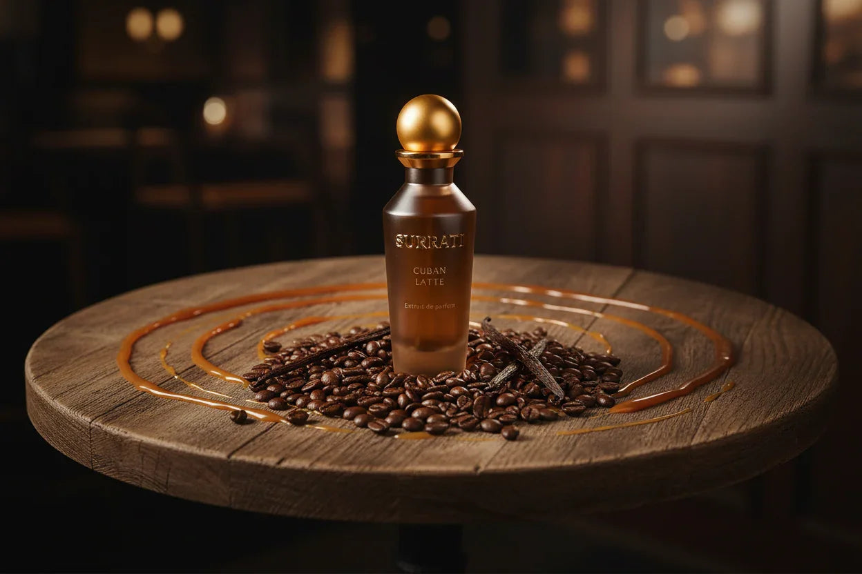 Cuban Latte perfume bottle on coffee beans with vanilla sticks and caramel drizzle, warm background
