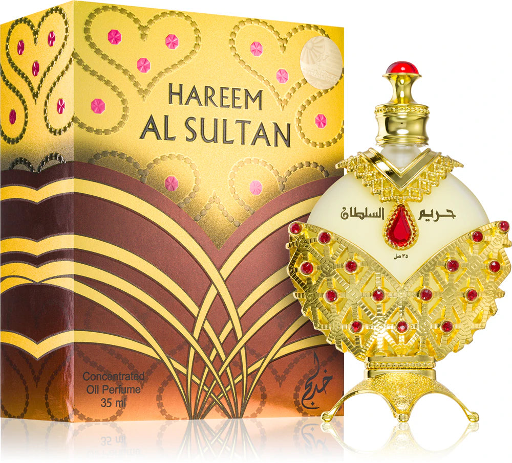 Hareem Al Sultan concentrated oil perfume bottle with ornate gold and red design, 35ml, next to matching decorative box.