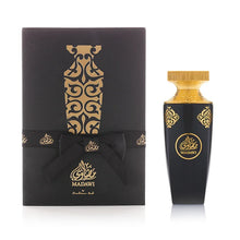 Luxury Arabian oud perfume bottle with gold detailing and matching black gift box