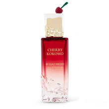 Cherry Kokomo eau de parfum bottle with cherry-themed cap, luxurious red and gold design