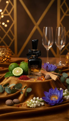 Luxury perfume bottle with black bow, surrounded by bergamot, saffron, nutmeg, lotus flowers, and wine glasses on a gold satin surface