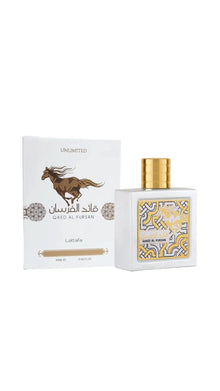 Qaed Al Fursan Unlimited perfume bottle with gold cap and decorative white box, Arabian oud fragrance.