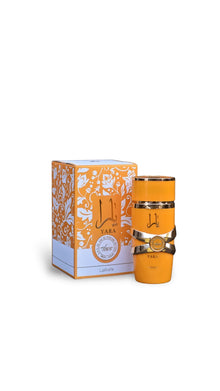 Yara by Lattafa orange perfume bottle with gold accents and decorative box, Arabian fragrance