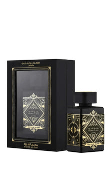 Oud for Glory Badee Al Oud perfume bottle and box with black and gold geometric design