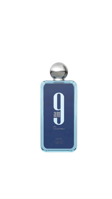 Blue Afnan 9am Dive perfume bottle with silver cap on white background
