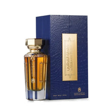 Al Qurashi Blend Arabian oud perfume bottle with gold cap and blue textured gift box