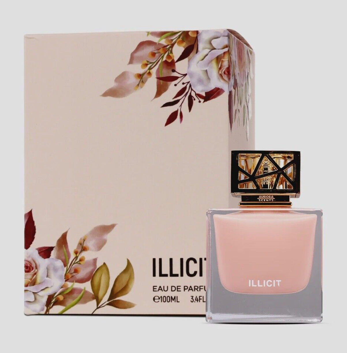 Perfume bottle and packaging with floral design on a light background