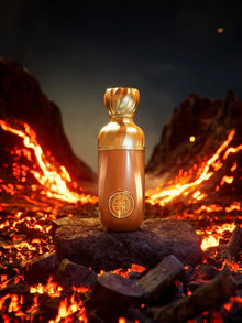 Golden oud perfume bottle on a rock with glowing lava background, luxury fragrance display