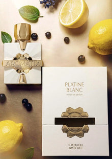 Aromatix Platine Blanc perfume with gold accents, fresh lemons, mint leaves, blackcurrants, and lavender
