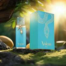 Vulcan Feu perfume bottle with gold snake detail and matching box, outdoors in sunlight