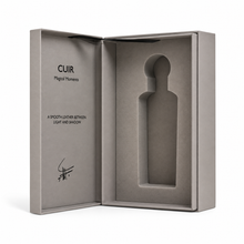 Original open grey Cuir presentation box with empty bottle recess and Magical Moments lettering