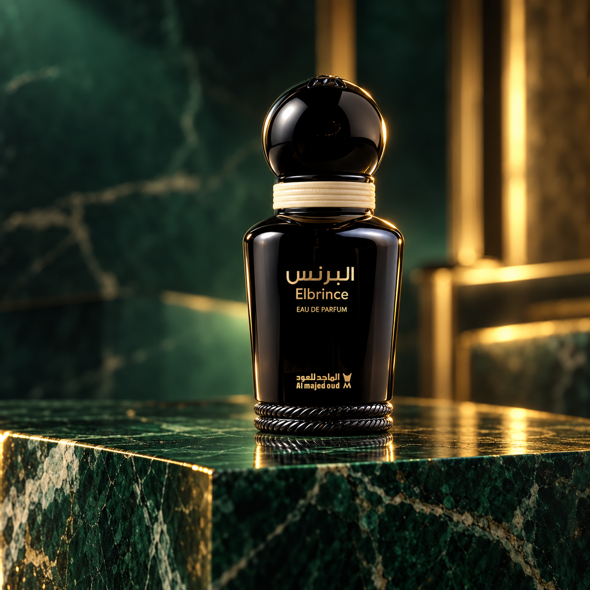 Elbrince Eau de Parfum 15ml bottle on emerald marble with warm gold rim lighting