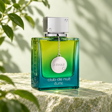 Armaf Club de Nuit Elite EDP 105ml bottle photographed from a three-quarter angle on pale green stone