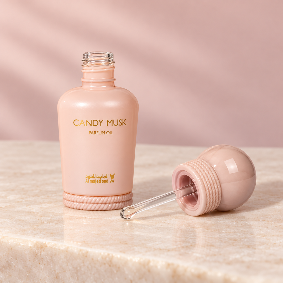 Candy Musk 15ml perfume oil uncapped with the original clear dabber wand attached to its spherical cap