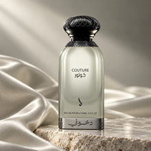 DKHONI Couture 100ml Eau de Parfum — bottle on a premium studio set