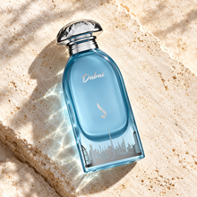 DKHONI Dubai 100ml Eau de Parfum — overhead bottle composition