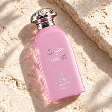 DKHONI Haneet 100ml Eau de Parfum — overhead bottle composition