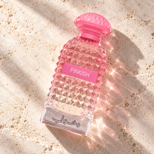 DKHONI Pinkish 100ml Eau de Parfum — overhead bottle composition