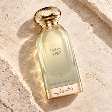 DKHONI Queen 100ml Eau de Parfum — overhead bottle composition