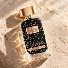 DKHONI Signature Rose Gold 100ml Eau de Parfum — overhead bottle composition
