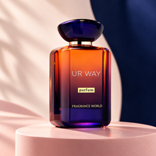 Ur Way Parfum orange-to-blue bottle on blush pedestal