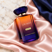 Overhead Ur Way Parfum bottle on pink silk and ivory marble