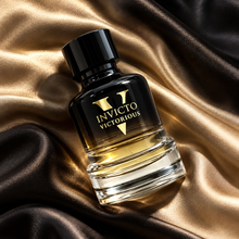 Fragrance World Invicto Victorious 100ml bottle in an overhead silk composition