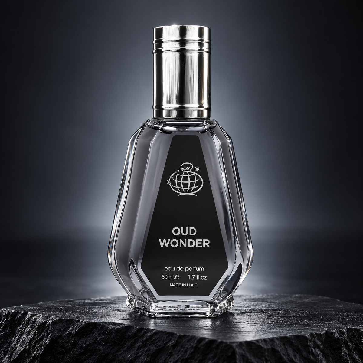 Oud Wonder 50ml smoky glass bottle with silver cap in studio