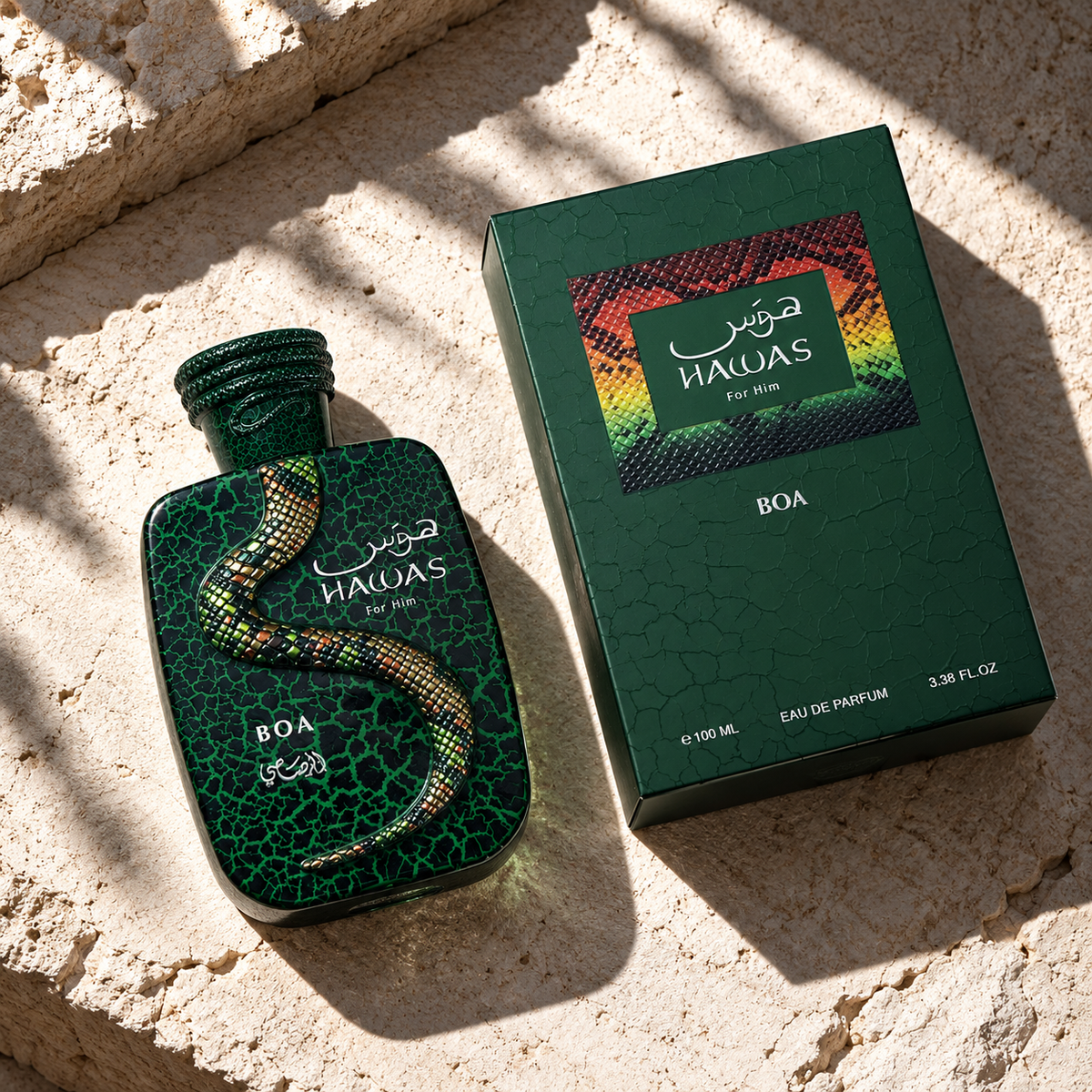 Rasasi Hawas Boa EDP 100ml bottle and original box photographed overhead on pale stone