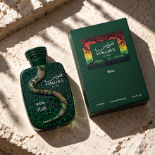 Rasasi Hawas Boa EDP 100ml bottle and original box photographed overhead on pale stone