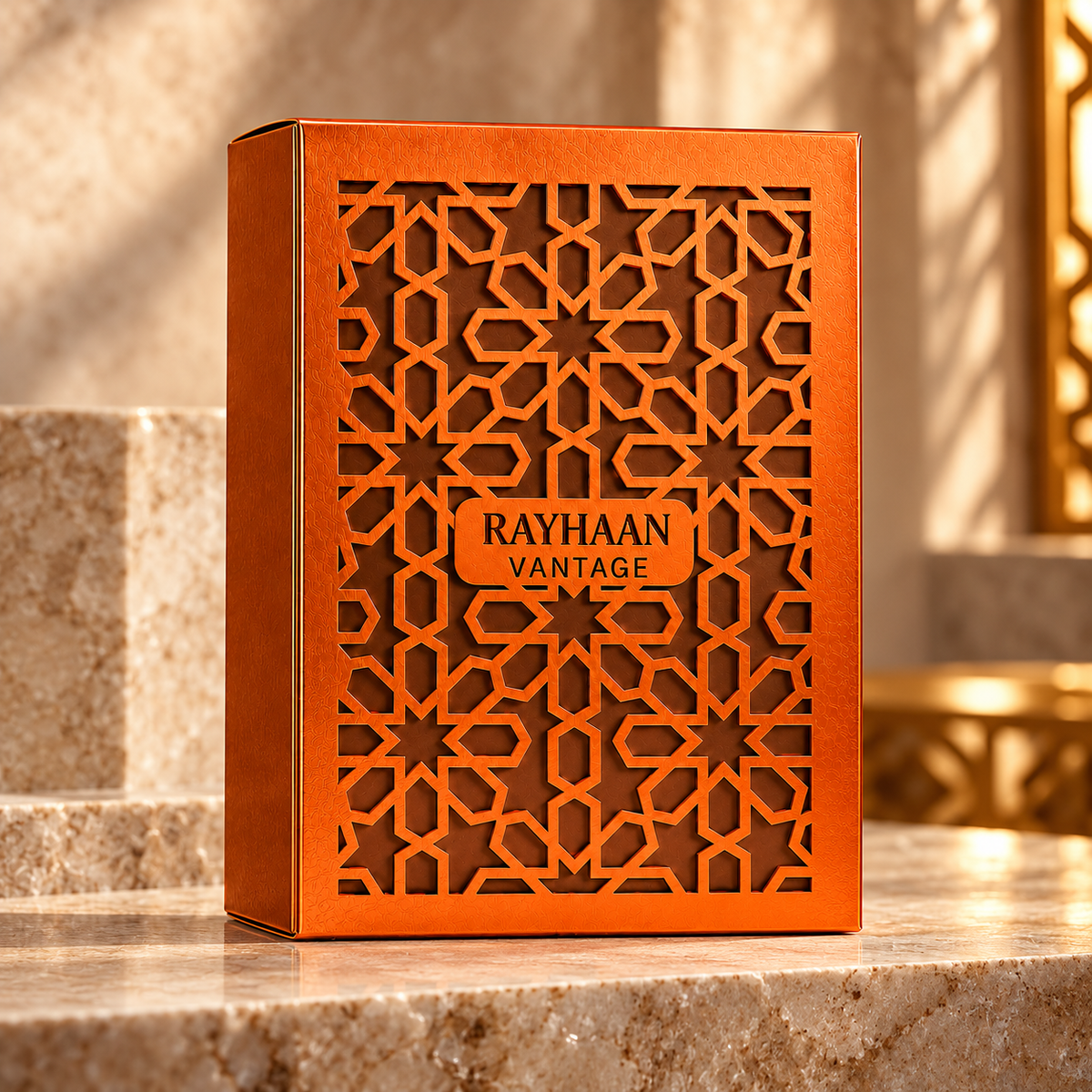 Original orange Rayhaan Vantage retail box on warm stone