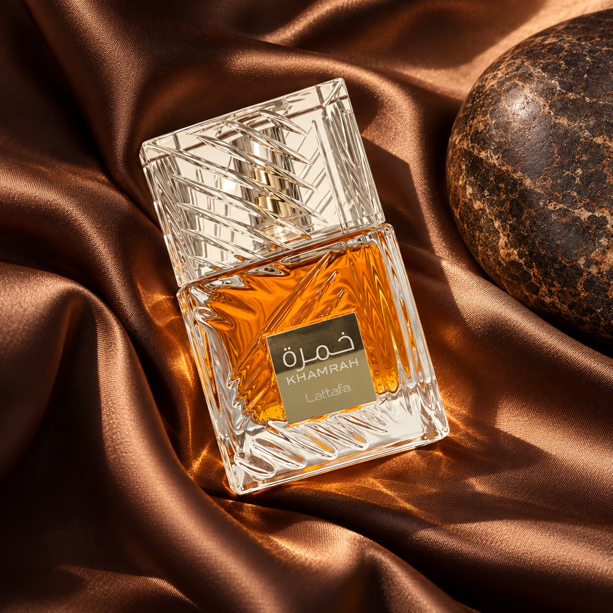 Lattafa Khamrah Eau de Parfum 100ml – overhead bottle composition